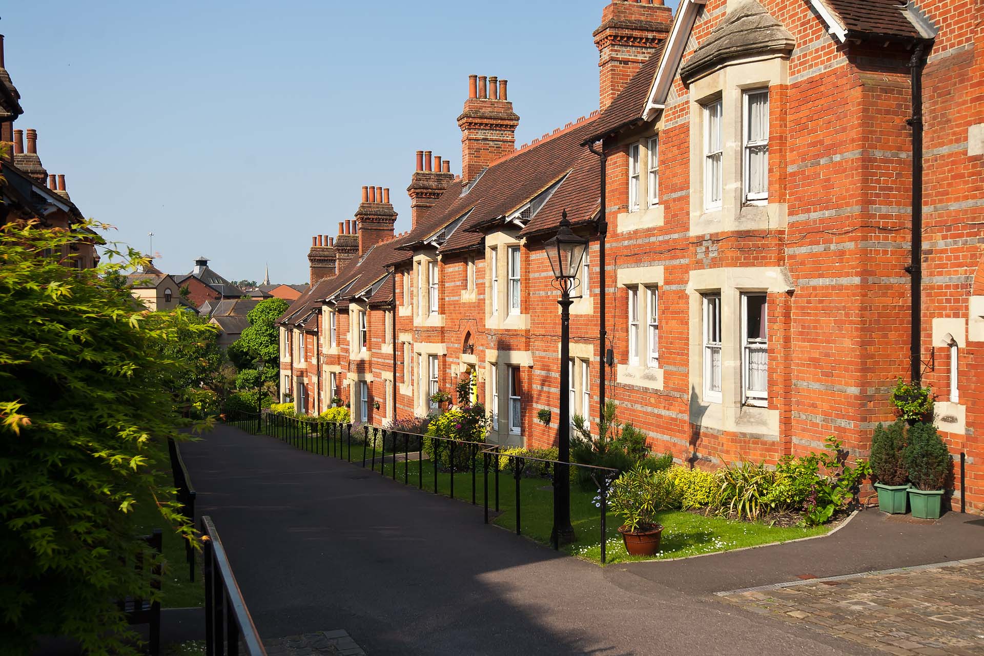 a row of terraced houses in a street